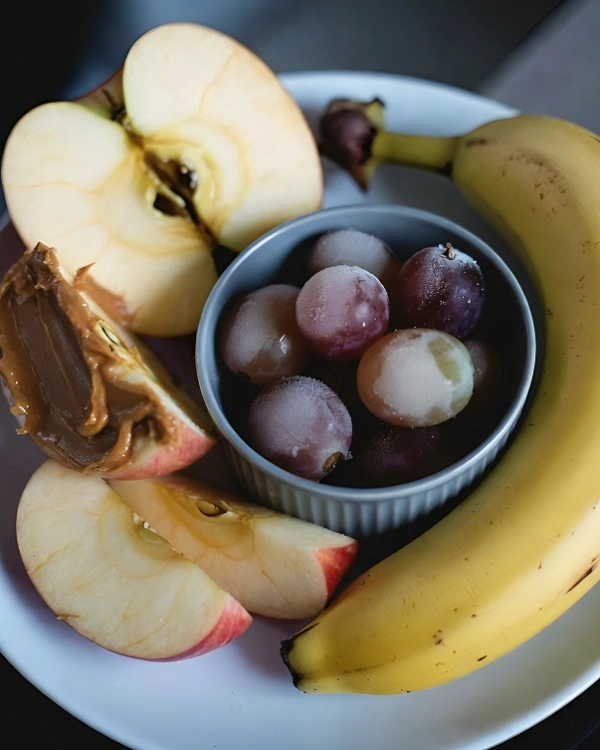 apple slices with peanut butter banana and frozen grapes no cook snack