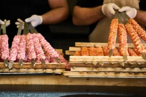 Adana kebab skewers with spicy and mild minced meat prepared on grill Turkish food heat comparison