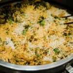 Vegetable biryani rice in a pan with herbs and spices, close-up homemade meatless rice dish