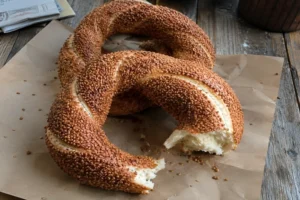 Turkish simit bread rings coated with toasted sesame seeds, freshly baked with a golden crust and soft interior